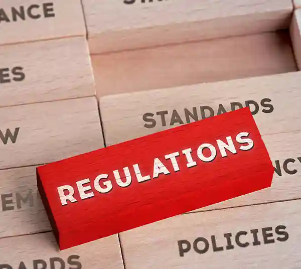 red block with the word regulations on it